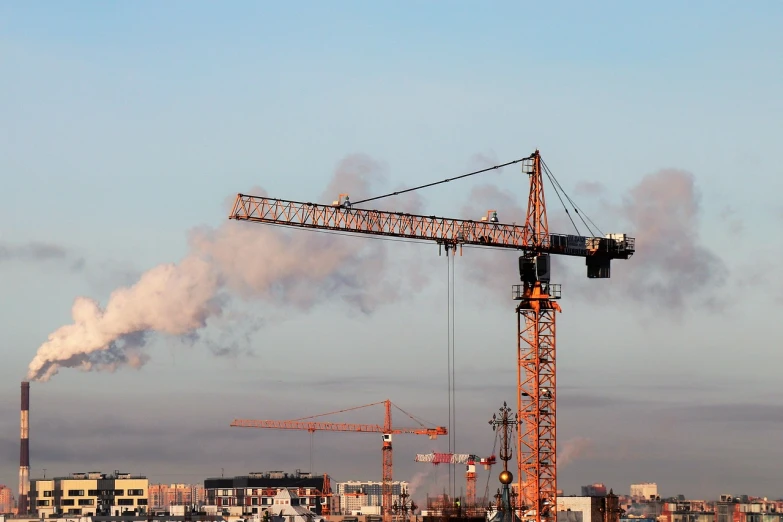 a large crane with a lot of smoke coming out of it, constructivism, swedish urban landscape, discovered photo