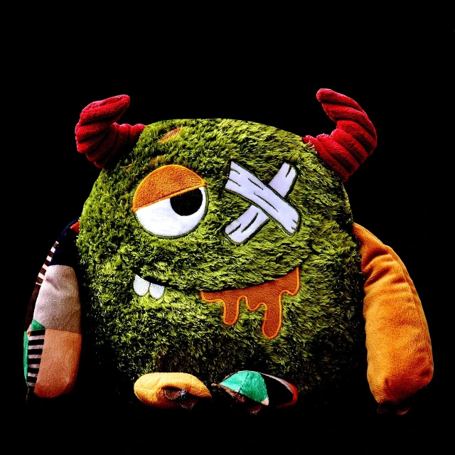 a close up of a stuffed animal on a black background, by Murakami, manly monster tough guy, highly detailed product photo