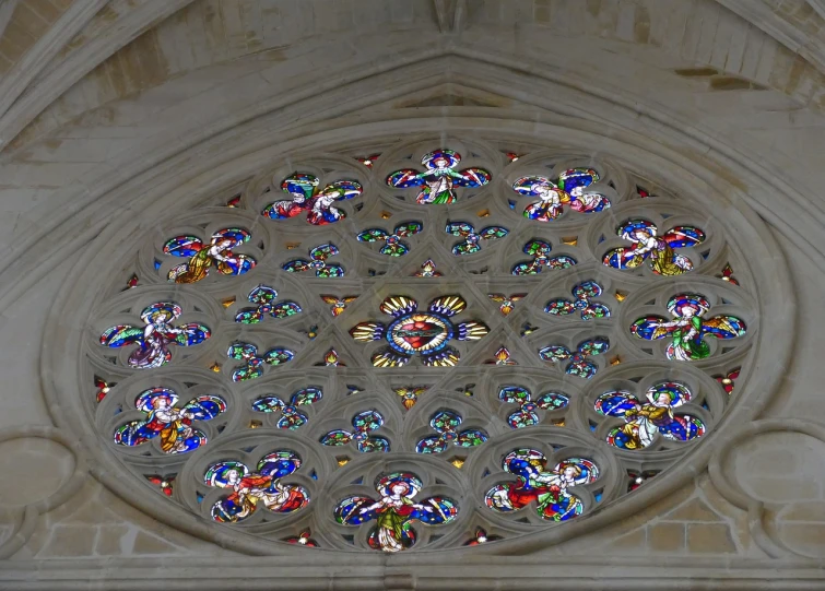 a close up of a stained glass window in a building, a mosaic, inspired by Master of Saint Giles, flickr, interior of a marble dome, grossmünster, closeup photo, carved from sapphire stone