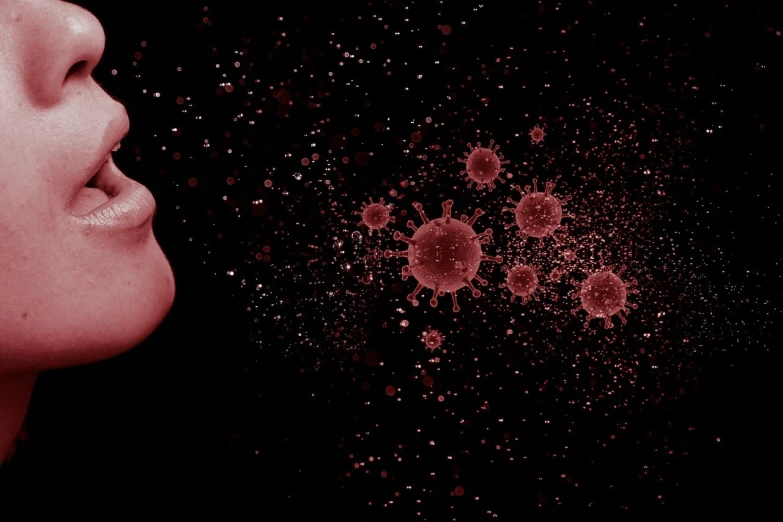 a close up of a woman with her mouth open, by Mirko Rački, pexels, digital art, blood cells, poster of corona virus, spraying liquid, orb