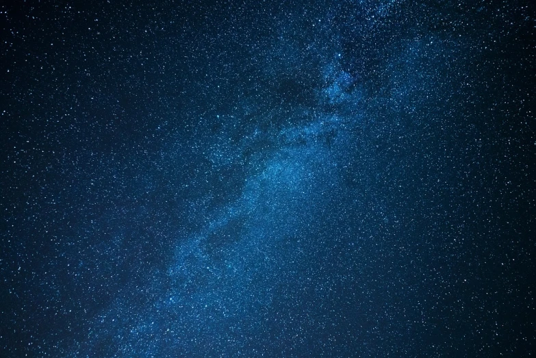 the milky shines brightly in the night sky, minimalism, under a sea of stars, mid - shot