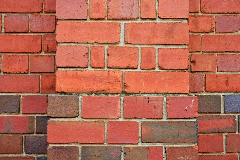 a fire hydrant in front of a brick wall, inspired by John Wollaston, modernism, different closeup view, seams, 1 8 7 6, red bricks