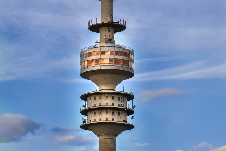 a tall tower with a clock on top of it, a stock photo, by Hans Schwarz, shutterstock, bauhaus, lookout tower, vienna city, 2 0 0 mm telephoto, octa 8k