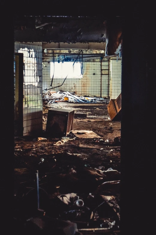 a room filled with lots of debris next to a window, by Sebastian Spreng, pexels, hospital ward, buildings covered in black tar, tarnished and rusted metal, tyler west