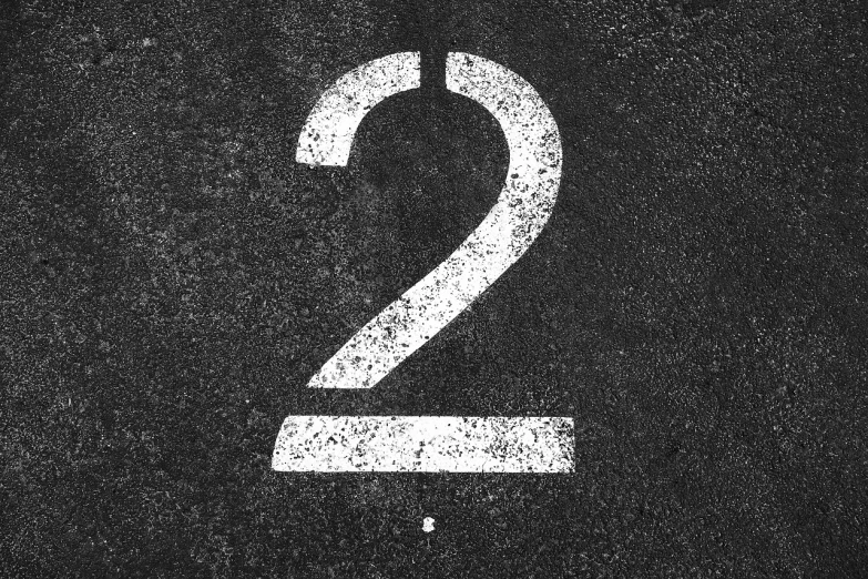 a number two painted on the side of a road, a poster, unsplash, postminimalism, monochrome:-2, engraving, mobile wallpaper, pictogram