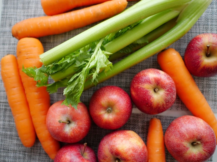 a pile of carrots, apples, celery and carrots, foodphoto, 3 4 5 3 1, abcdefghijklmnopqrstuvwxyz, soup