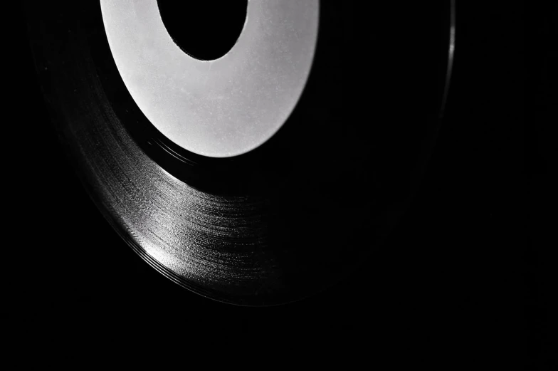 a black and white photo of a vinyl record, by Doug Ohlson, close - up studio photo, high quality photo, mid night, r&b
