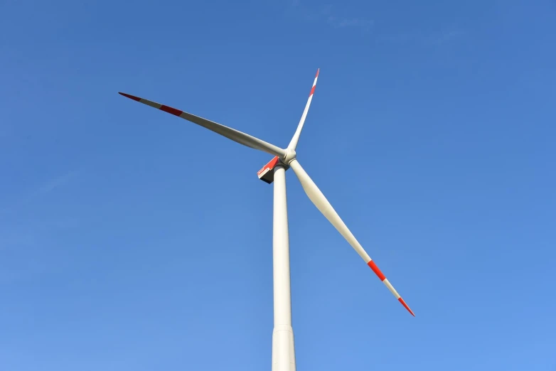 a close up of a wind turbine on a clear day, a portrait, bauhaus, maintenance photo, very sharp photo