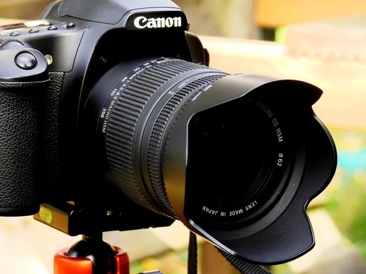 a close up of a camera on a tripod, by Jason Felix, pixabay, canon eos 7d mark ii, macro lens product photo, canon ts-e 17 mm, with wide angle lens