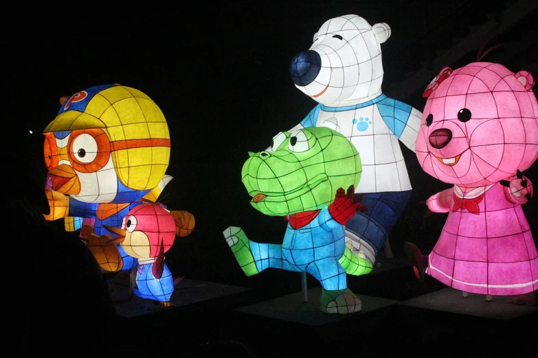a group of paper animals standing next to each other, a cartoon, inspired by Jeff Koons, flickr, interesting lights, beijing, photo from the olympic games, four humanoid bears