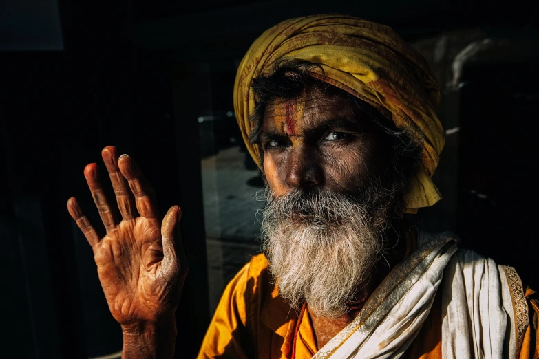 a man with a white beard and a yellow turban, unsplash contest winner, blessing hands, backlit beautiful face, india ink, a druid