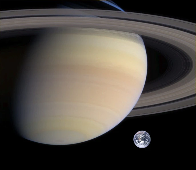 a close up of a planet with saturn in the background, flickr, renaissance, photo of earth from space, moonwalker photo, huge gargantuan scale, 2 0 1 0 photo