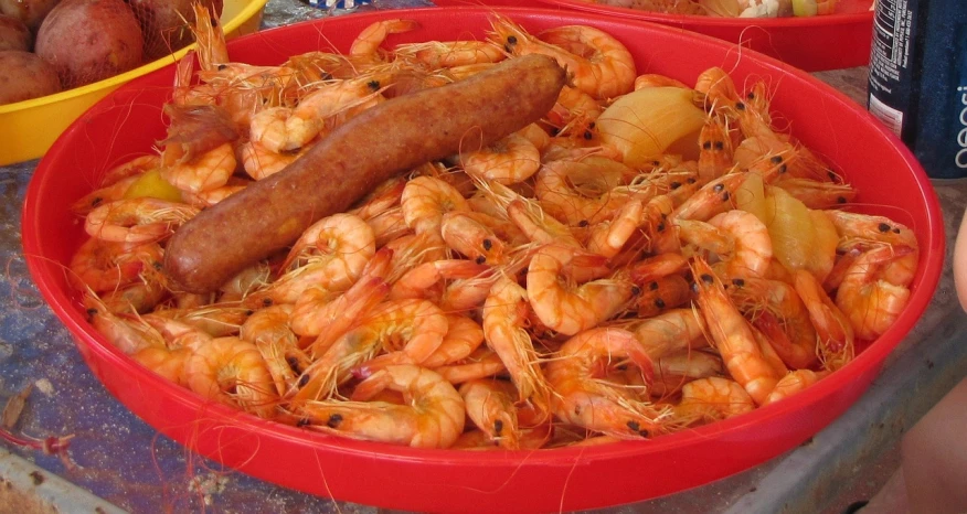 a red bowl filled with shrimp and sausage, by Robert Lee Eskridge, dau-al-set, discovered photo, carnival, closeup!!!!!!, fresh kill