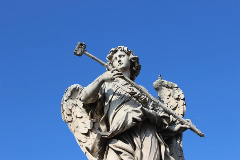 a statue of an angel holding a sword, a statue, by Cagnaccio di San Pietro, shutterstock, stock photo, low angle photo, highly detailed photo, high details photo