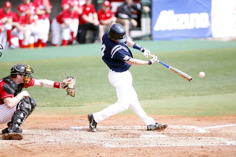 a baseball player swinging a bat at a ball, flickr, college, stock photo, rays, trending photo