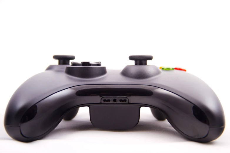 a close up of a video game controller, by Jason Felix, istockphoto, on a white background, lightbox, xbox