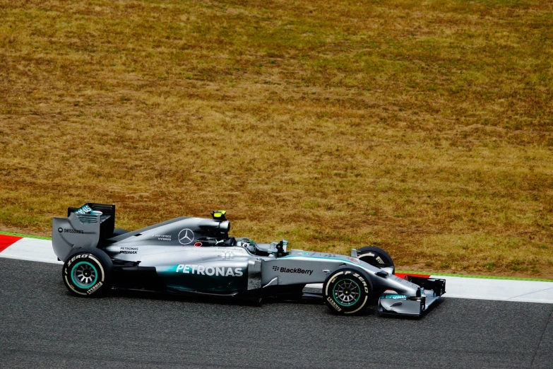 a close up of a racing car on a race track, by Hiroyuki Tajima, flickr, shin hanga, mercedes, “ full body, dezeen, f 1 1