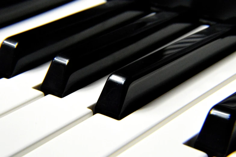 a close up of the keys of a piano, a picture, inspired by Kawai Gyokudō, wikimedia commons, glossy plastic, [ [ hyperrealistic ] ], banner
