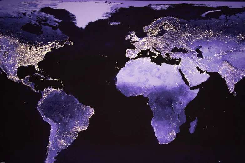 a close up of a map of the world at night, a photo, digital art, purple lighted street, backlit, global lighting, winter sun