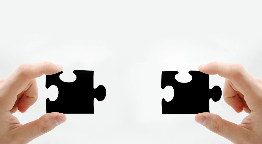 two hands holding two pieces of black puzzle, a jigsaw puzzle, pexels, minimalism, diptych, phone wallpaper, 3840 x 2160, white backround