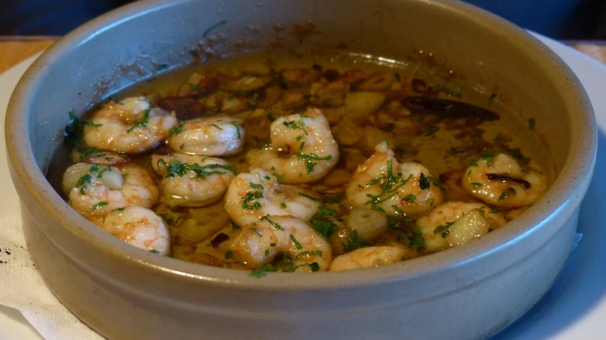 a close up of a bowl of food on a table, by Tom Carapic, flickr, renaissance, shrimp, steaming food on the stove, herb, piroca