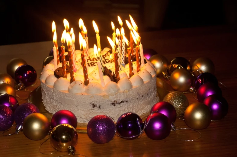 a birthday cake sitting on top of a table, by Aleksander Gierymski, pixabay, happening, christmas night, party balloons, waxy candles, wikimedia commons