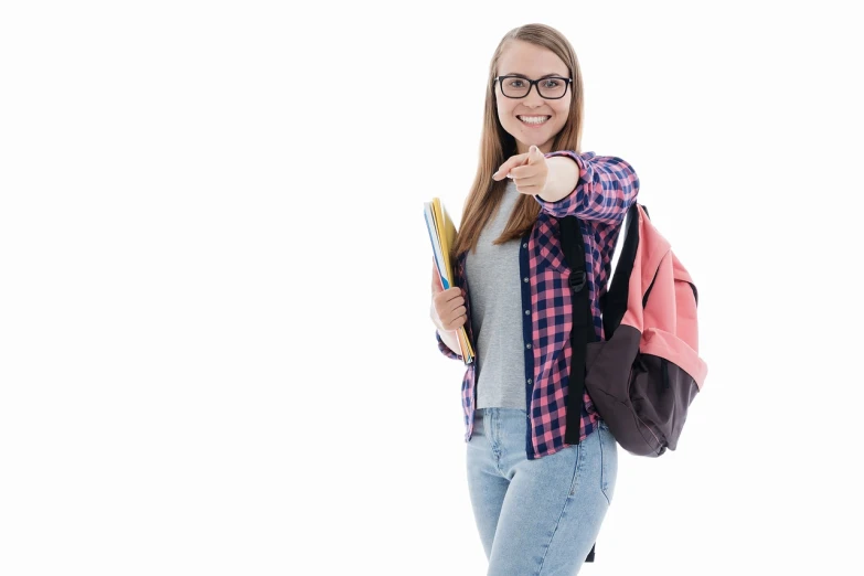 a woman holding a book and pointing at the camera, shutterstock, teenage female schoolgirl, on white background, with a backpack, holding books