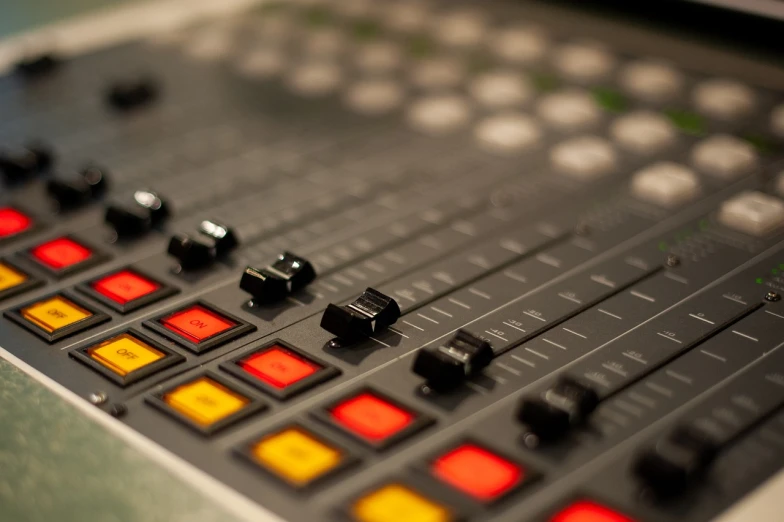 a close up of a control board in a recording studio, shutterstock, realism, journalism, warm shading, stock photo