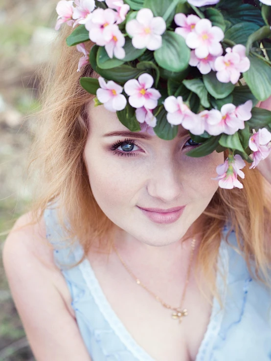 a woman with a flower crown on her head, a portrait, by Maksimilijan Vanka, shutterstock, blue eyes and blond hair, dslr photo of a pretty teen girl, flowers around, evanna lynch