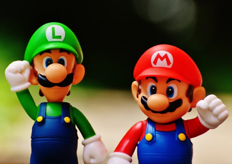 a close up of two figurines of mario and luigi, a macro photograph, inspired by Mario Comensoli, unsplash, typical cryptocurrency nerd, gmod, heroic, omg