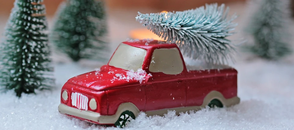 a toy truck with a christmas tree on top of it, a picture, by Eugeniusz Zak, square, snowy, crisp details, featured