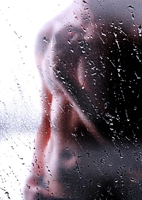 a person standing in front of a window covered in rain, a stock photo, by Aleksander Gierymski, conceptual art, detailed veiny muscles, detailed zoom photo, slightly erotic, under a shower