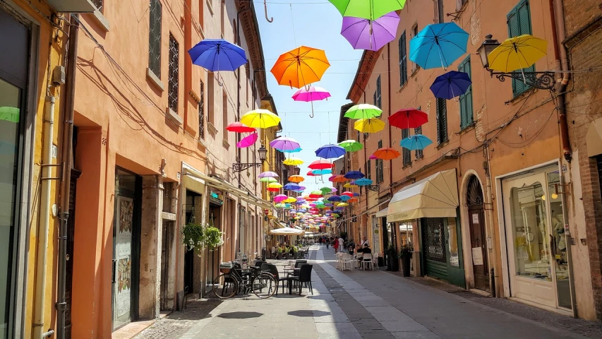 a street filled with lots of colorful umbrellas, a photo, by Antonio Saura, shutterstock, bizzaro, 🕹️ 😎 🔫 🤖 🚬, empty streetscapes, pastels