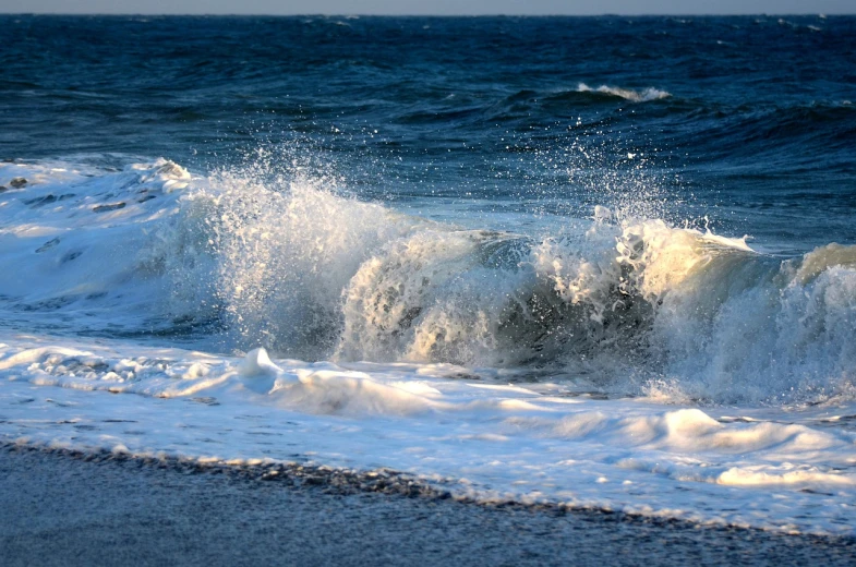 a man riding a wave on top of a surfboard, by Edward Corbett, shutterstock, fine art, black sea, windy beach, glistening seafoam, img _ 9 7 5. raw