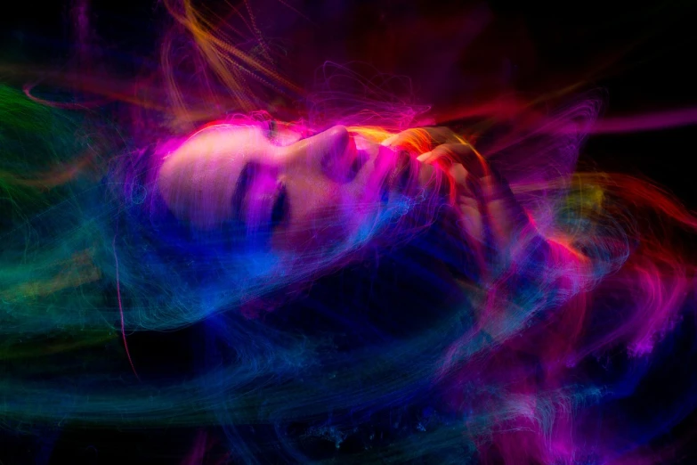 a close up of a person holding a cell phone, digital art, inspired by Arik Brauer, digital art, glowing flowing hair, lying on an abstract, hyper color photograph, portrait of magical young girl