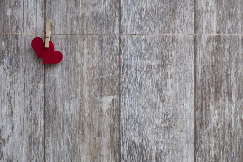 a red heart hanging on a clothes line, a photo, by Jan Kupecký, pexels contest winner, minimalism, seamless wooden texture, grayish, 1128x191 resolution, wallpaper - 1 0 2 4