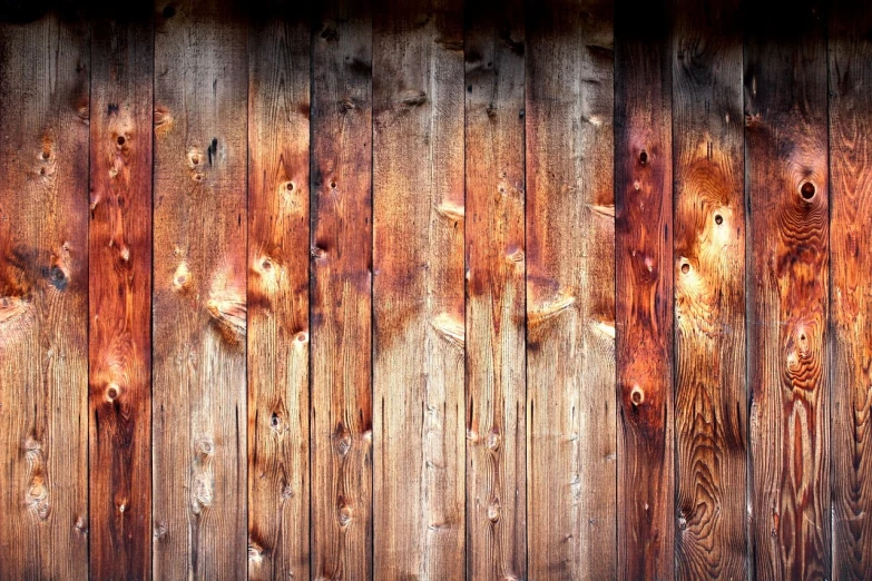 a close up of a wooden wall with a fire hydrant, by Alexander Bogen, renaissance, 4 k hd wallpaper very detailed, new mexico, high colored texture, setting sun