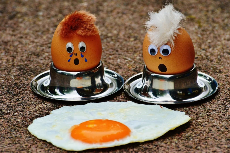 a couple of eggs sitting on top of a plate, a photo, pixabay, funny faces, 😃😀😄☺🙃😉😗, cooked, on a sunny day