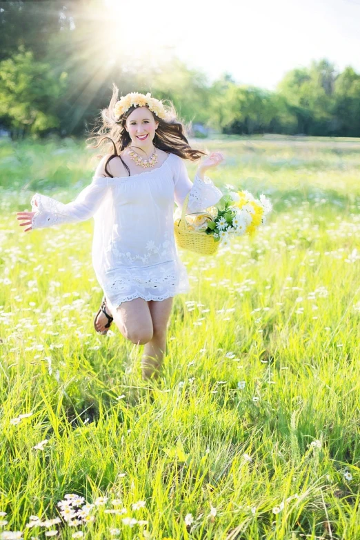 a woman in a white dress running through a field, by Maksimilijan Vanka, pixabay contest winner, 1960s flower power hippy, sweet smile, white tunic, white flower crown