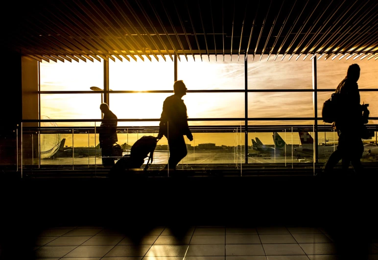 a couple of people that are standing in front of a window, by Niko Henrichon, pexels, black. airports, going forward to the sunset, illustration!, trapped on a hedonic treadmill