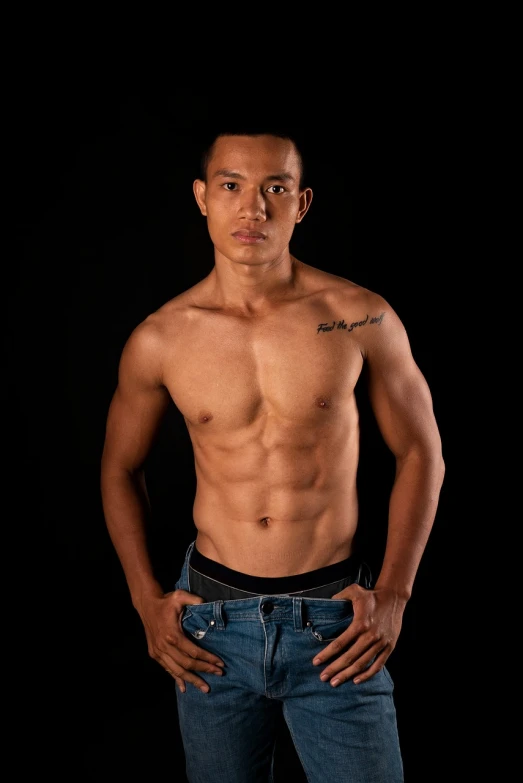 a shirtless man standing with his hands on his hips, a photo, inspired by Randy Vargas, studio portrait photo, malaysian, high exposure photo, half body photo