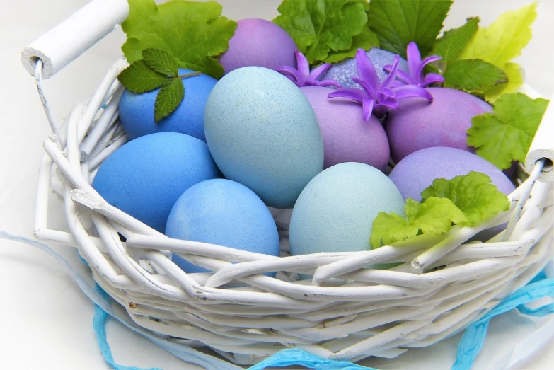 a basket filled with blue and purple eggs, a pastel, pixabay, blue and green, an award winning, bunny, white and purple