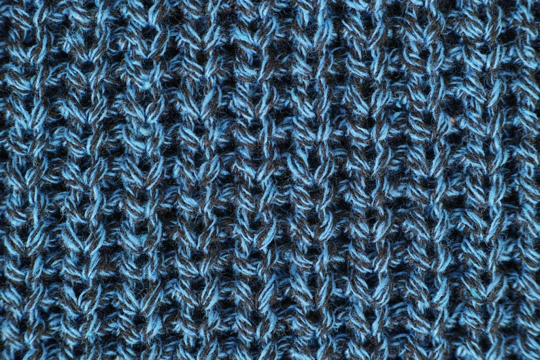 a close up of a blue knitted blanket, a stipple, by Alexander Brook, blue-black, seamless micro detail, highly detailed product photo