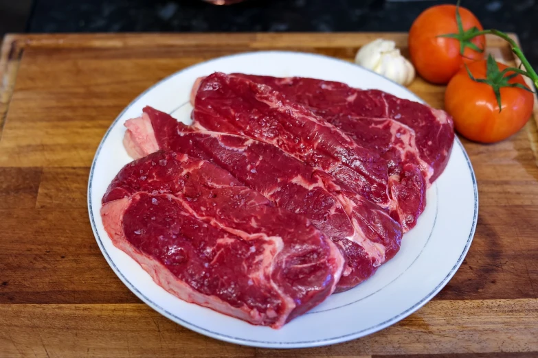 a piece of steak sitting on top of a white plate, superflat, high quality product image”, thin red veins, bian lian, 2 years old