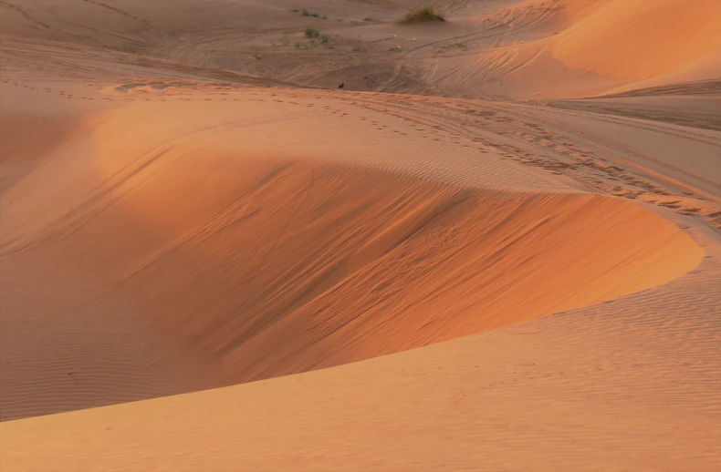 a person riding a horse in the desert, a picture, inspired by Frederick Goodall, sinuous, red!! sand, 1128x191 resolution, shot in canon 50mm f/1.2