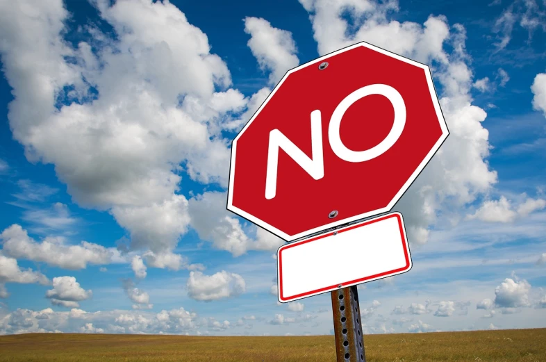a red stop sign sitting on the side of a road, a stock photo, shutterstock, fine art, nothingness, no speech bubbles, blue sky, no - text no - logo