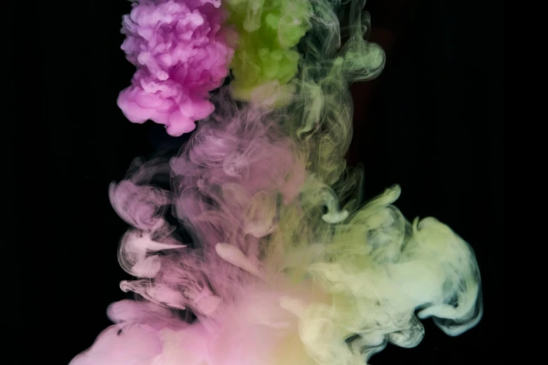 a close up of colored smoke on a black background, inspired by Kim Keever, abstract illusionism, pink and green, ink blot, colored flowers, 4k high res