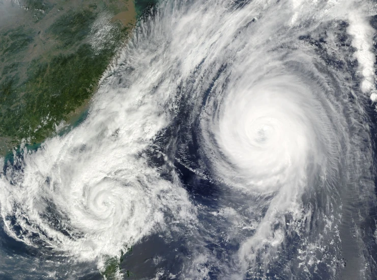 a satellite image of a hurricane in the middle of the ocean, a portrait, by Wen Boren, shutterstock, adult pair of twins, taiwan, high detail product photo, stock photo