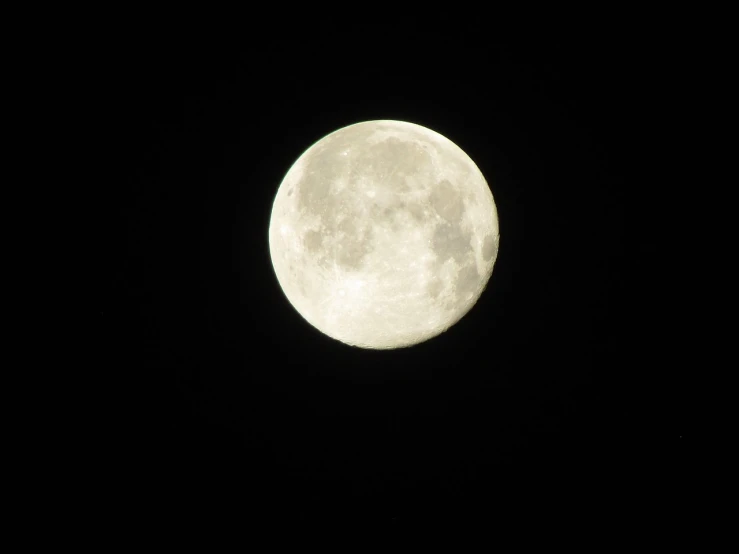 a full moon is seen in the dark sky, by Linda Sutton, hurufiyya, mid shot photo