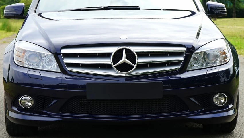 the front of a blue mercedes benz benz benz benz benz benz benz benz benz benz benz benz, a picture, pexels, trimmed with a white stripe, a large, rectangular, very very realistic
